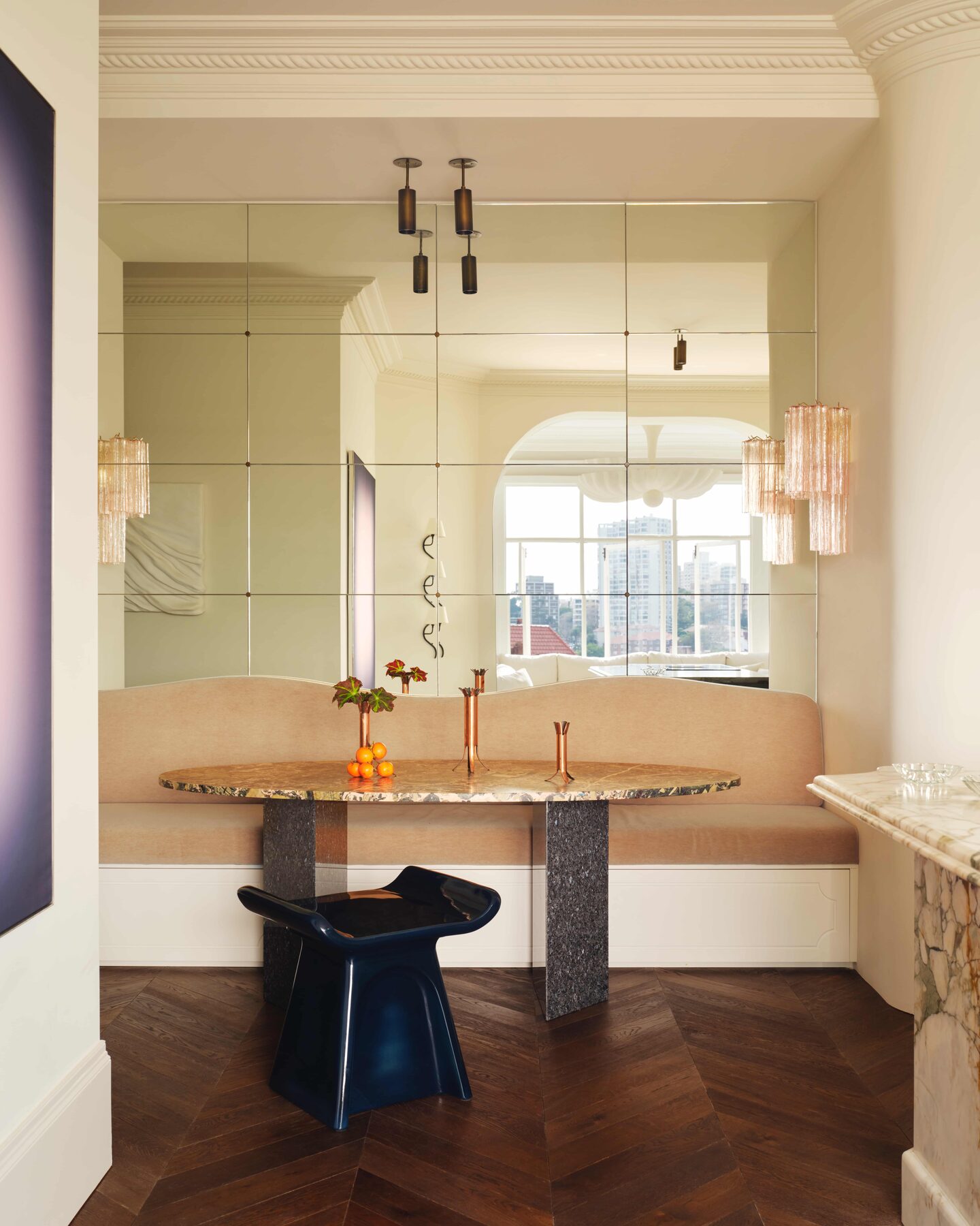 Cream panelled kitchen with richly veined stone — view 4
