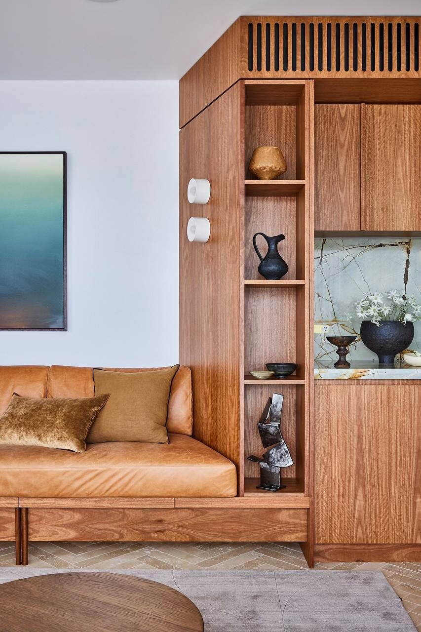Warm timber kitchen with rust-veined stone — view 3