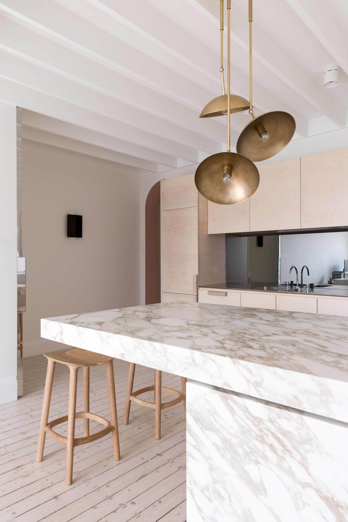 Blonde timber kitchen with marble and brass detailing — view 9